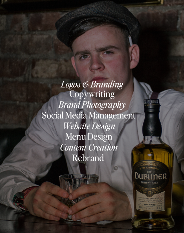 Image of boy with grandad cap and Dubliner whiskey in background, test says logo & branding, copywriting, brand photography, social media management, website design, menu design, content creation, rebrand